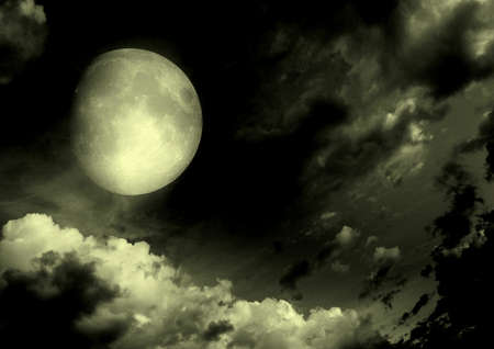 The moon in the night sky in clouds 3D illustrationの写真素材