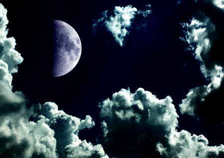 The moon in the night sky in clouds 3D illustrationの写真素材