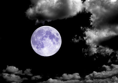 The moon in the night sky in clouds 3D illustrationの写真素材