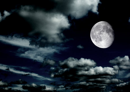 The moon in the night sky in clouds 3D illustrationの写真素材