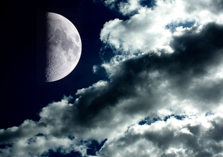 The moon in the night sky in clouds 3D illustrationの写真素材