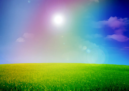 green grass against the blue skyの写真素材