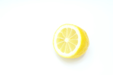 Sliced lemon isolated on a white backgroundの写真素材