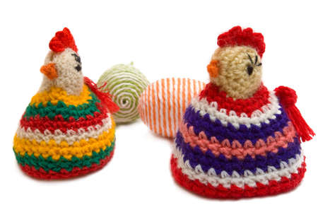 Easter still-life. Homemade cocks and eggs on white backgroundの写真素材