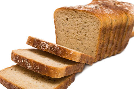 Sliced, delicious, fresh bread on white background