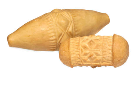 Traditional Polish smoked cheese - oscypek on white backgroundの写真素材