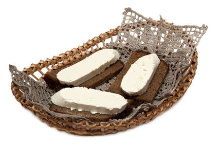 Sandwiches with wholemeal bread and white cheese on white backgroundの写真素材