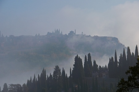the hill of orvieto emerges from the mistの写真素材