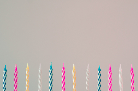 range of colored  candles on the white backgroundの写真素材