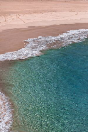 Nature poster. Clear water of the ocean and sand beach