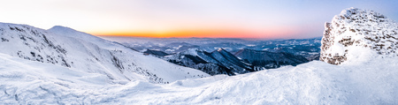 panoramic view of sunset in the mountainsの写真素材