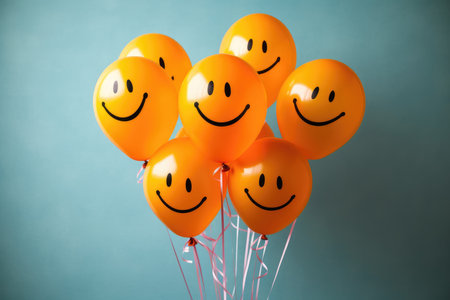 Yellow baloons with a painted smile on background. holiday. birthday. high quality photo