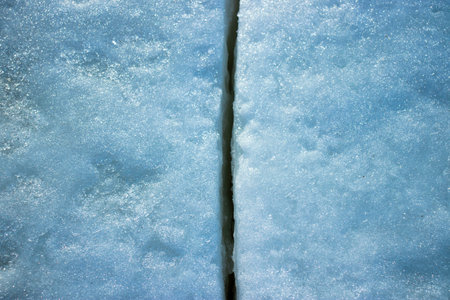 Ice and crack, crevice. Ice and snow texture. High quality photoの写真素材