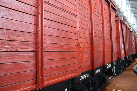 Railway wooden train carriage. An antique freight car made of wood close-up. High quality photoの写真素材