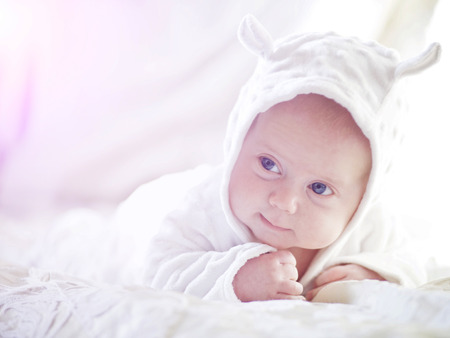 Newborn baby with hat and some clothes. Closeupの写真素材