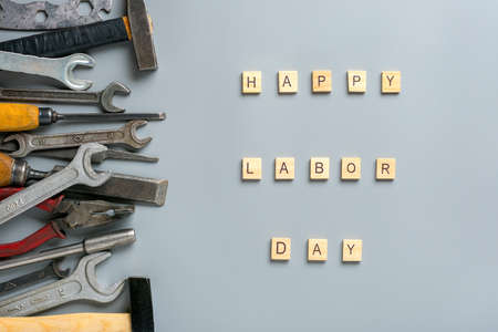 Happy Labor day concept Construction group home tools - hammer, saw, screwdriver, meter, pliers,...