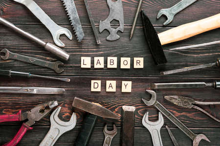 Happy Labor day concept Construction group home tools - hammer, saw, screwdriver, meter, pliers,...