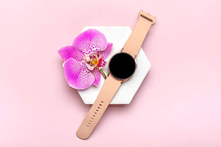Bangkok, Thailand, March 2022 Samsung Galaxy watch active 4, 40 mm on podium and box isolated on pink background.のeditorial素材
