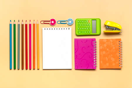 Frame from school and office supplies Paper clips, pens, calculator, sharpener, notepad, stapler...