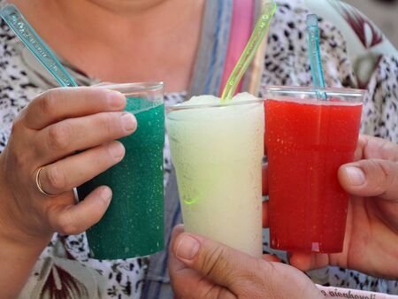 Colorful ice drinks look like italian flagの写真素材