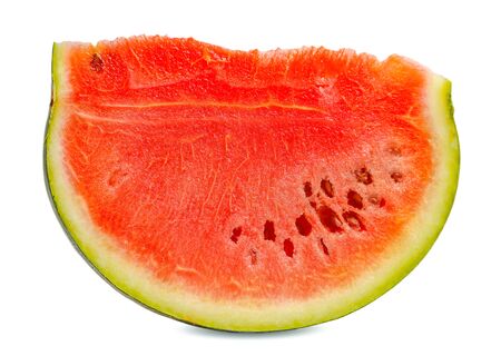 Isolated watermelon with cut watermelon slice with red flesh on white backgroundの写真素材