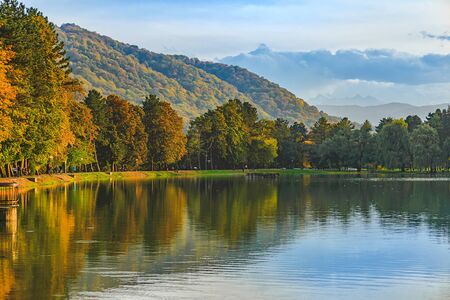 Autumn Park in October in the light of the setting sun. Park Atazhukinsky in the city of Nalchik,...