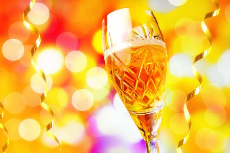 Christmas and New Year celebration with champagne. Christmas Golden lights.の写真素材