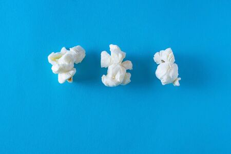 Three Popcorn on a bright blue background, design conceptの写真素材
