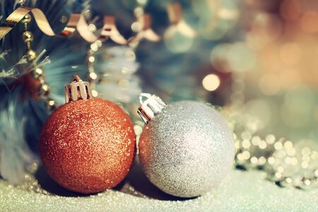 Vintage Christmas card. Colorful Christmas decorations on the background of fir branches.の写真素材