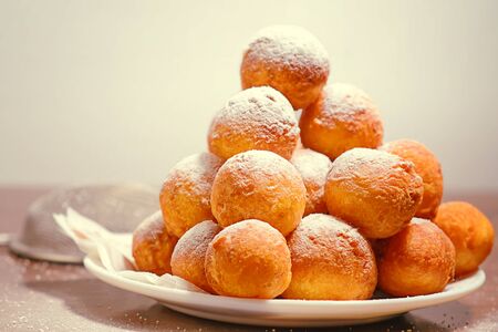 Doughnuts. Homemade cakes made from curd balls. Sweet doughnuts