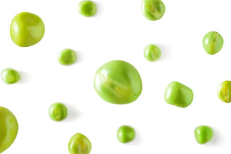 Falling peas on a white background. Scattered peas on a light backgroundの写真素材
