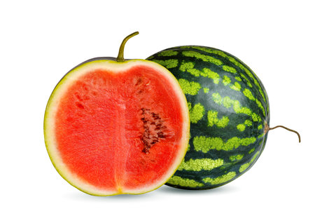 Ripe round watermelon and cut watermelon slice with red pulpの写真素材