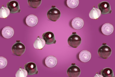 Randomly scattered purple onion on a purple backgroundの写真素材