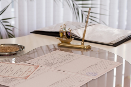 Marriage certificate in Legislative Assembly on the desktopの写真素材