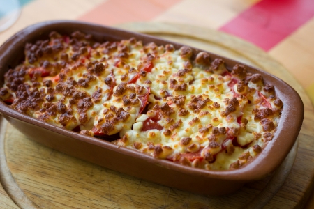 Beef tongue baked with vegetables in cheeseの写真素材