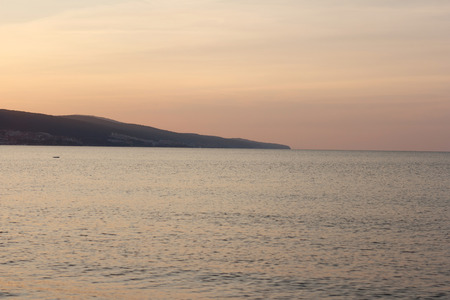 Early dawn over water at the seaの写真素材