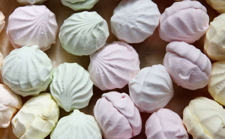 Fresh multicolored delicious air marshmallow lies in cardboard packaging prepared for sale in storesの写真素材