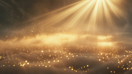 Golden elegant light rays illuminate a soft, sandy surface with sparkling particles. Scene conveys warmth and tranquility, ideal for backgrounds or abstract themesの素材