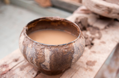 clay in a pot outsideの写真素材