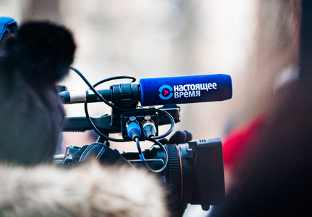 Moscow - Russia, February 25th 2018: camera with microphone of a russian tv company Nastoyaschye...