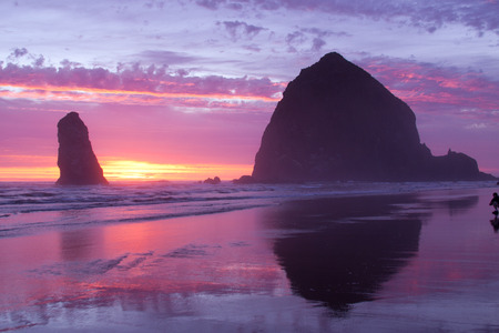 Haystack rock at Cannon Beach on the Oregon Coast in USA   This is a major tourist attraction on the PAcific coast の写真素材