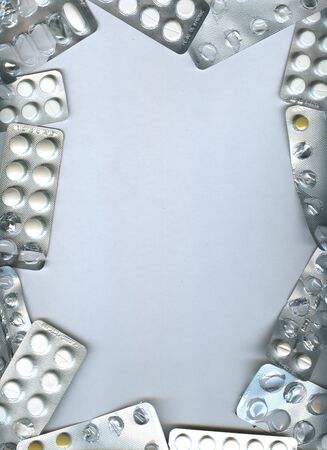 Pharmaceuticals antibiotics pills medicine frame background. capsule pill medicineMedical concept.