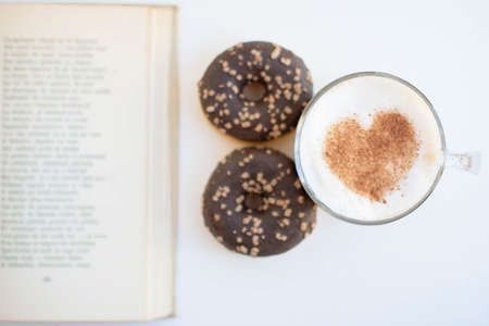 Morning coffee and a poem bookの写真素材