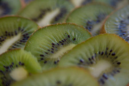 Kiwi fruit slices close-up, macro photography. Kiwi fruit background