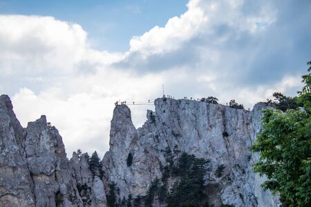 View from Mount Ai-Petri. Light sunny summer day, Crimea, Yalta, Russia. Cable bridge at height