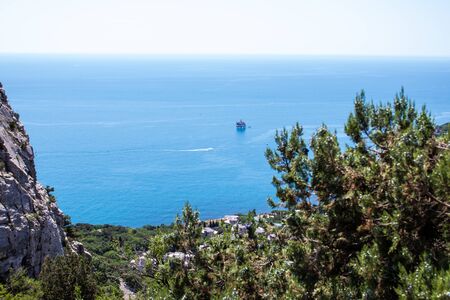 Black Sea view from the mountain. Light sunny summer day, Crimea, Russia.の写真素材