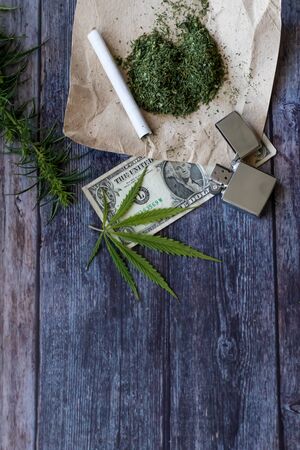 Marijuana herb Cook rolling hemp. Drug use. Drugs narcotic concept. copy spaceの写真素材