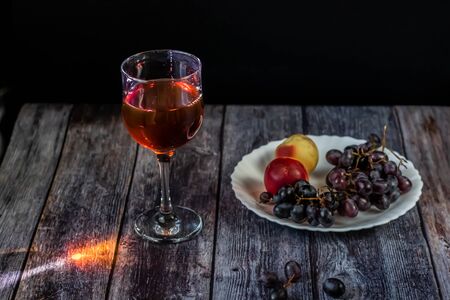 Amber wine. Wine in a glass. Traditional Georgian wine according to ancient technology. Close upの写真素材