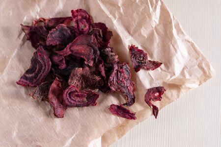 Baked beetroot slices with sea salt. Vegetarian diet recipe. Healthy homemade chips. Copy spaceの写真素材