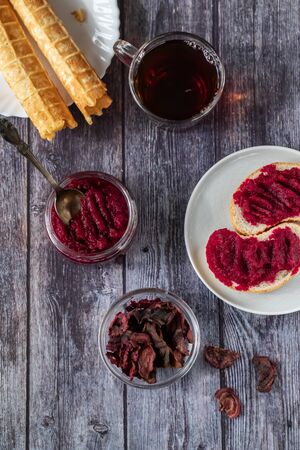 Sandwiches with natural, homemade beetroot jam, vanilla and sugar. Beetroot Chips. Healthy food, vegetarianism.の写真素材